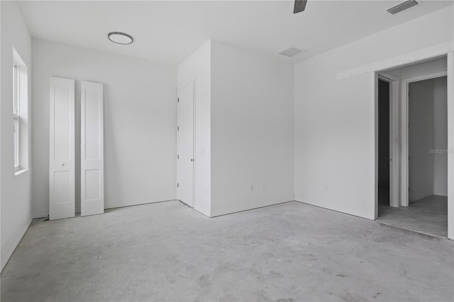 unfurnished bedroom with a closet and ceiling fan