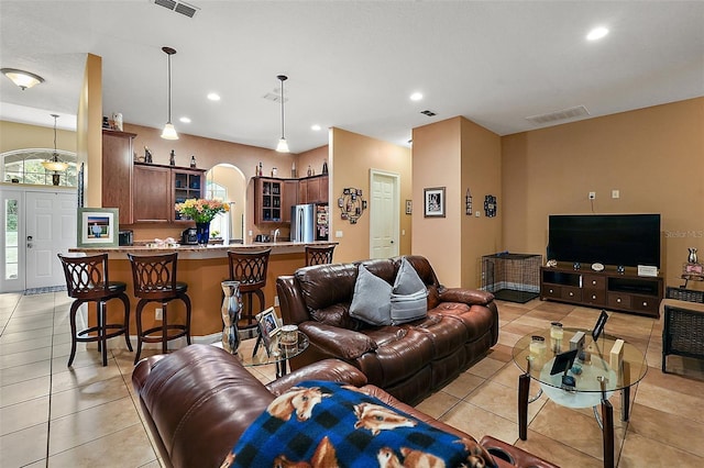 living room featuring light tile patterned flooring