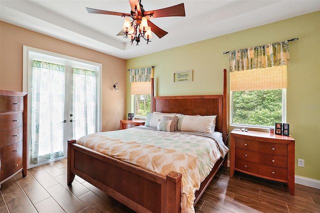 bedroom featuring ceiling fan and dark hardwood / wood-style floors