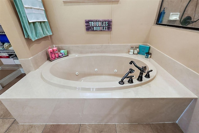 bathroom featuring a relaxing tiled tub