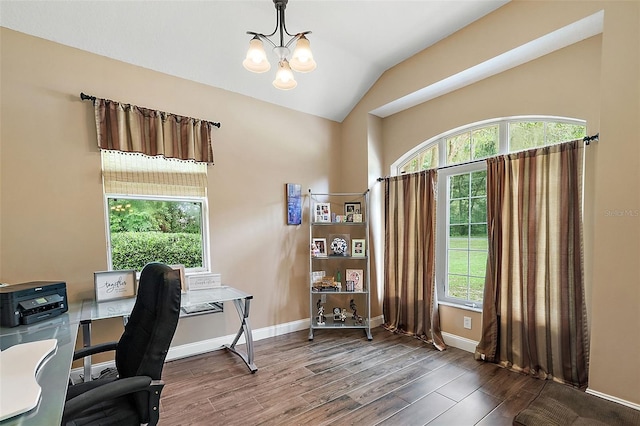 office area featuring vaulted ceiling, a wealth of natural light, an inviting chandelier, and dark hardwood / wood-style floors