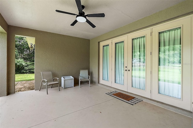 view of patio / terrace featuring french doors and ceiling fan