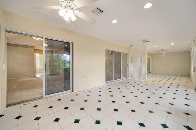 view of patio / terrace featuring ceiling fan