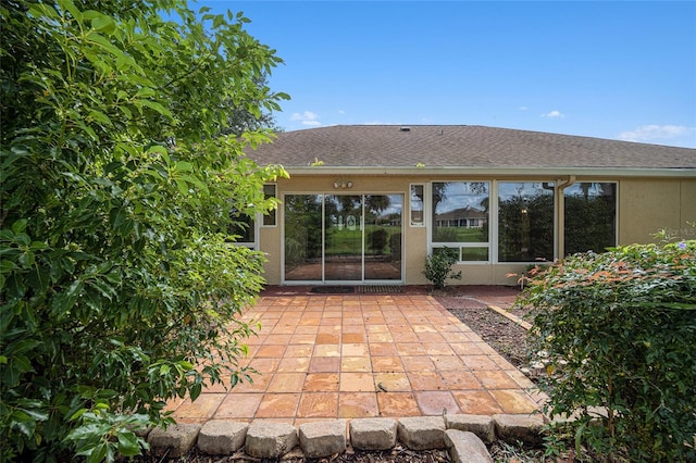 rear view of house with a patio area