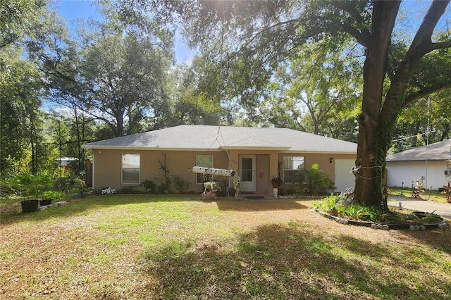 view of front of home with a front lawn