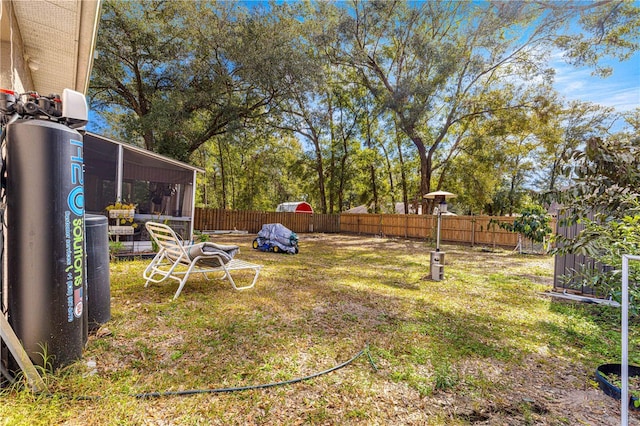 view of yard featuring a sunroom