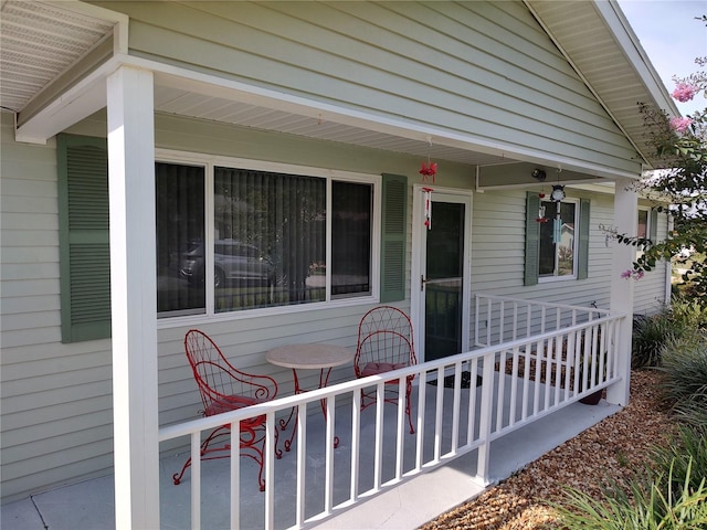 view of patio featuring a porch