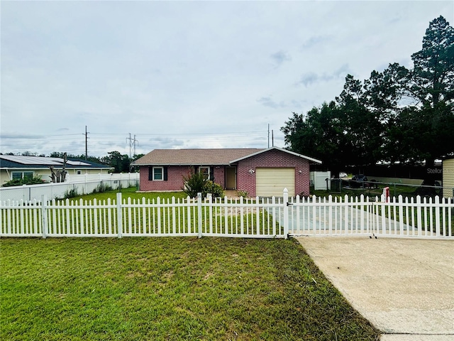 view of front of property featuring a front lawn and a garage