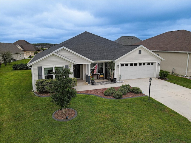 single story home with a garage and a front yard