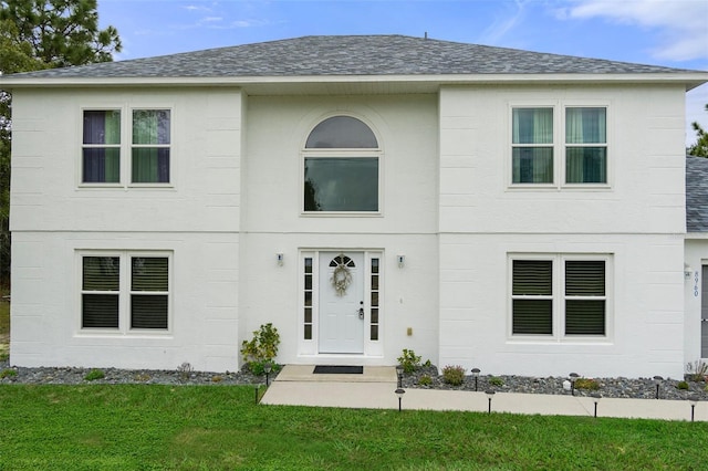 view of front of house with a front yard