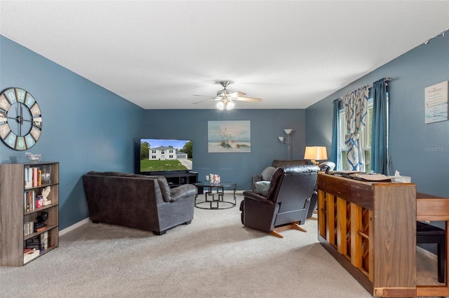 living room featuring ceiling fan and carpet floors