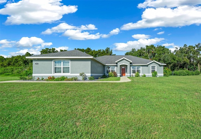 ranch-style home with a front yard