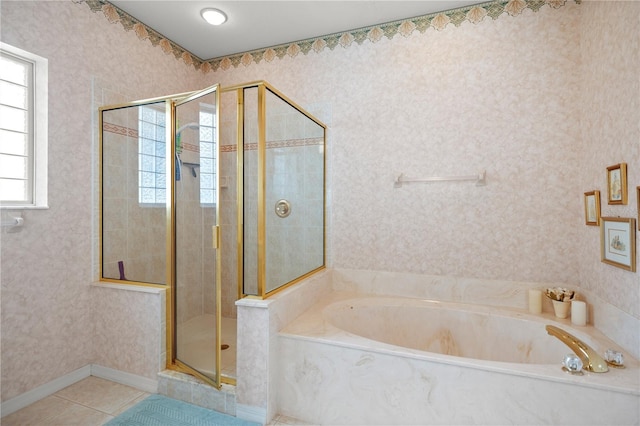 bathroom featuring independent shower and bath and tile patterned flooring