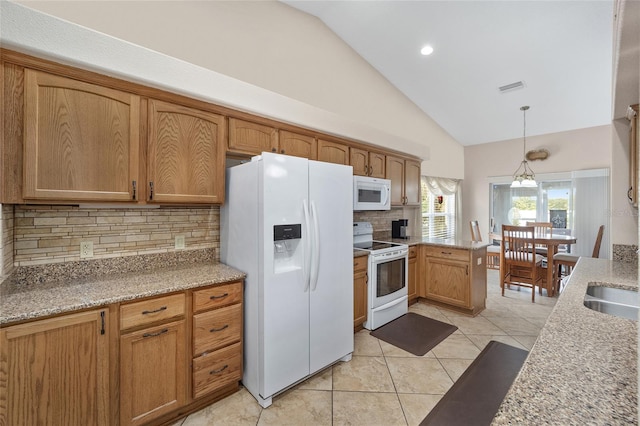 kitchen with light tile patterned floors, white appliances, high vaulted ceiling, pendant lighting, and tasteful backsplash