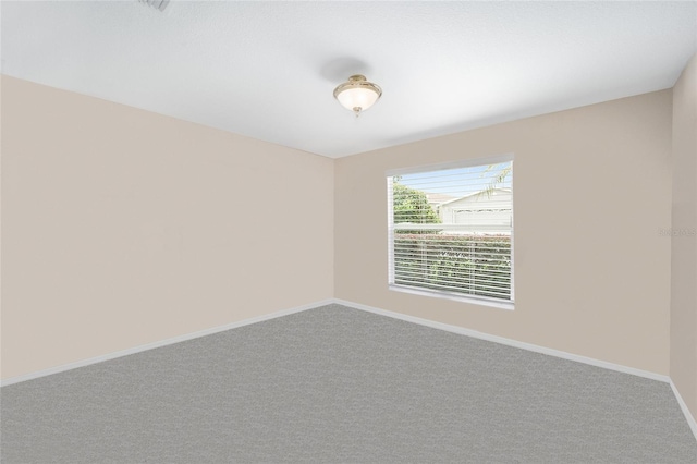 16369 SW 14th Avenue Rd, Ocala, FL 34473 - carpeted empty room with baseboards
