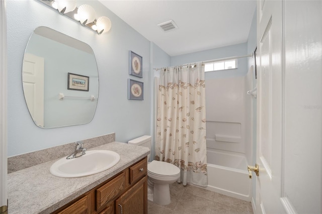 full bathroom with vanity, toilet, tile patterned flooring, and shower / bath combo with shower curtain