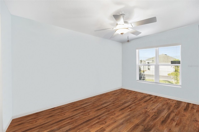 unfurnished room with wood-type flooring and ceiling fan