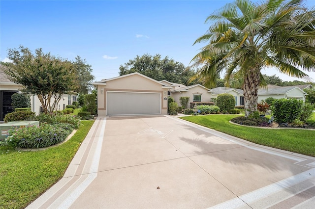 view of front of house with a garage and a front yard