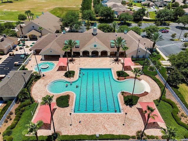 view of swimming pool with a patio