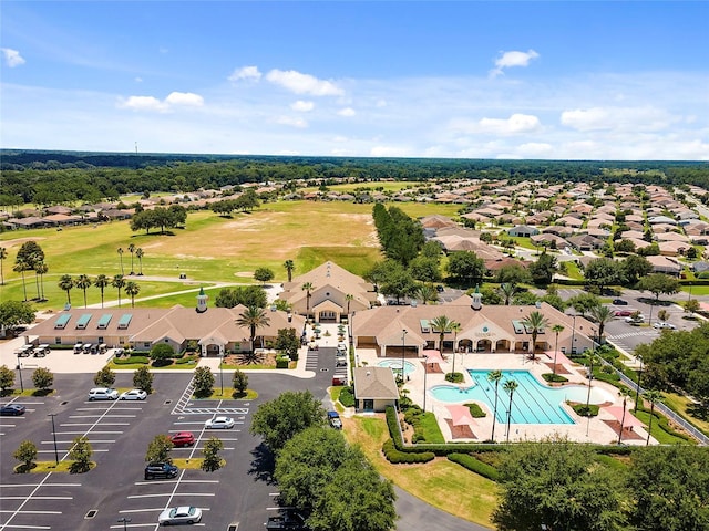 16369 SW 14th Avenue Rd, Ocala, FL 34473 - aerial perspective of suburban area with a pool