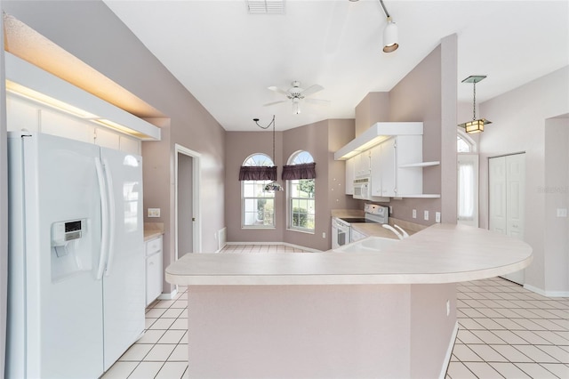 kitchen featuring decorative light fixtures, white appliances, kitchen peninsula, white cabinetry, and ceiling fan