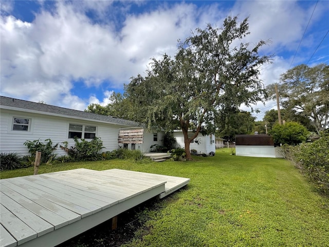 view of yard featuring a deck