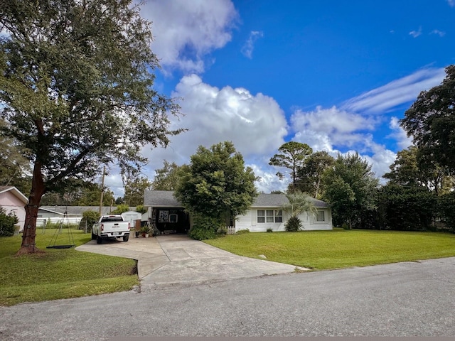 single story home featuring a front lawn