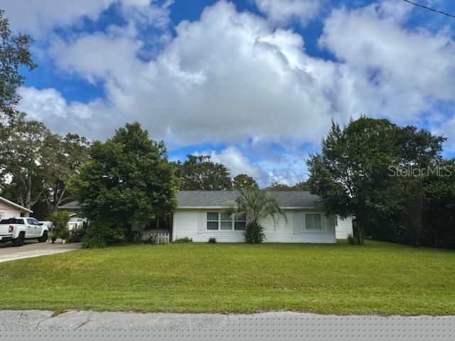 view of front of home with a front yard