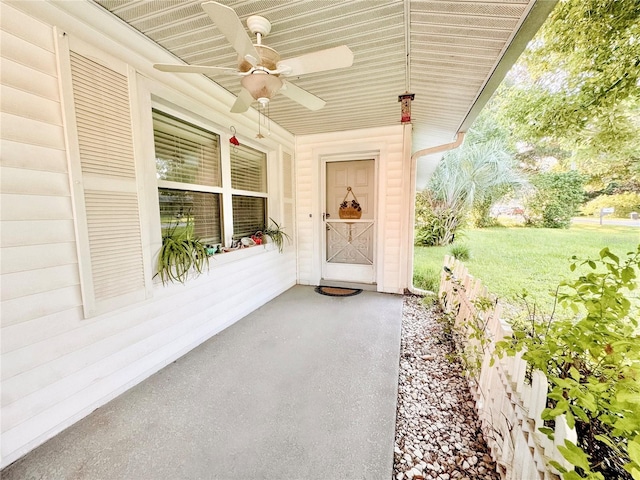 view of patio featuring ceiling fan