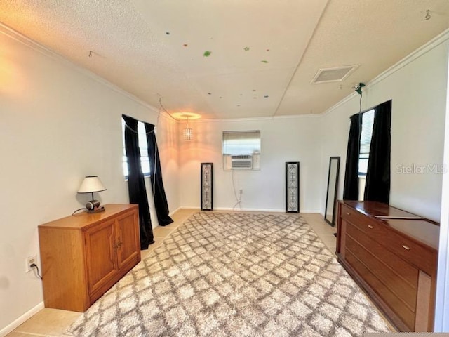 bedroom with a textured ceiling, cooling unit, ornamental molding, and light carpet