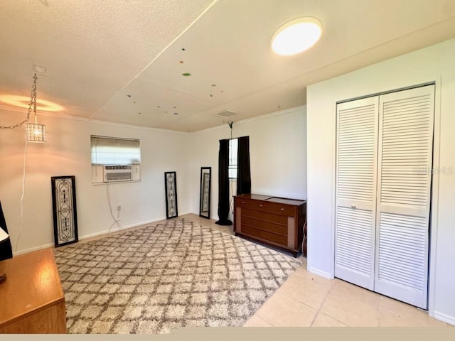 interior space featuring cooling unit, ornamental molding, and light tile patterned floors