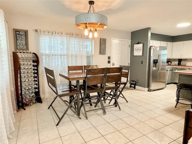 view of tiled dining space