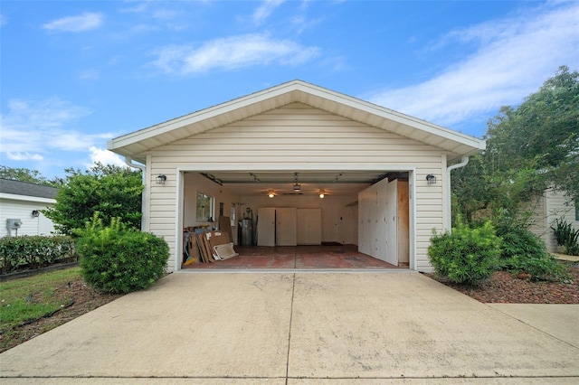 garage featuring wooden walls