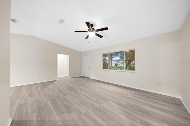 unfurnished room with light wood-type flooring, vaulted ceiling, and ceiling fan