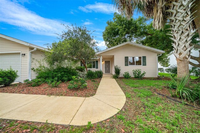 single story home with a garage