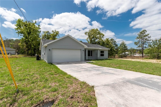 ranch-style house with a garage and a front yard