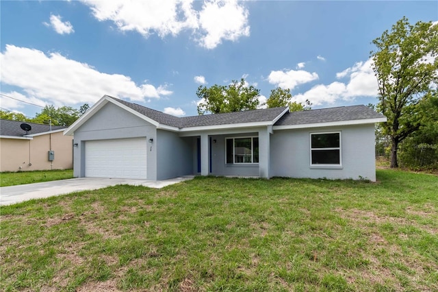 single story home featuring a garage and a front yard