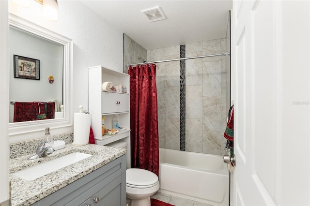 full bathroom featuring toilet, vanity, shower / tub combo with curtain, and a textured ceiling