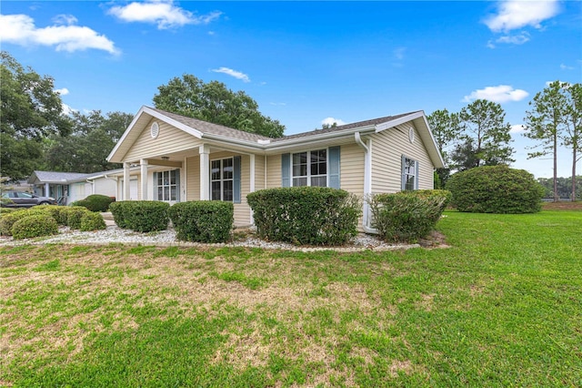 view of home's exterior featuring a lawn