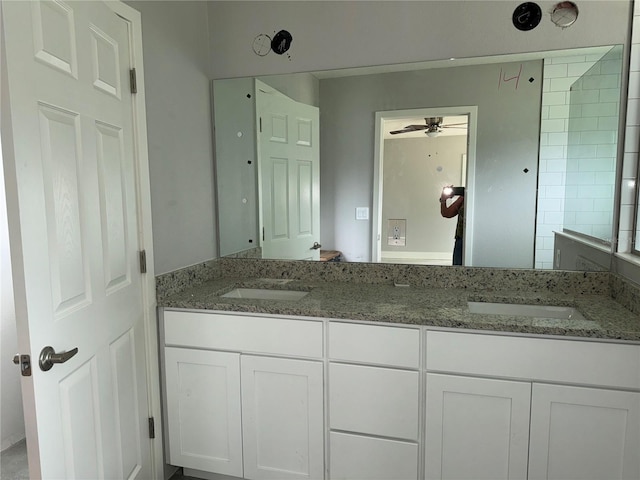 bathroom featuring vanity and ceiling fan