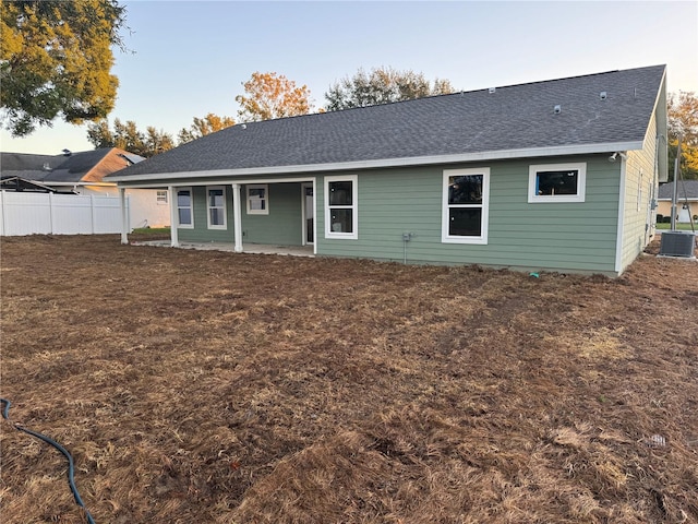 back of house featuring a patio and cooling unit