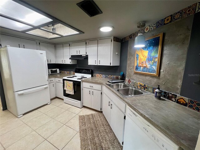 kitchen with pendant lighting, light tile patterned flooring, sink, white cabinets, and white appliances