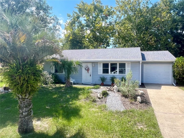 ranch-style home with a garage and a front yard