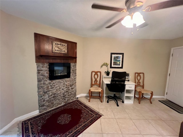 home office featuring ceiling fan and light tile patterned flooring