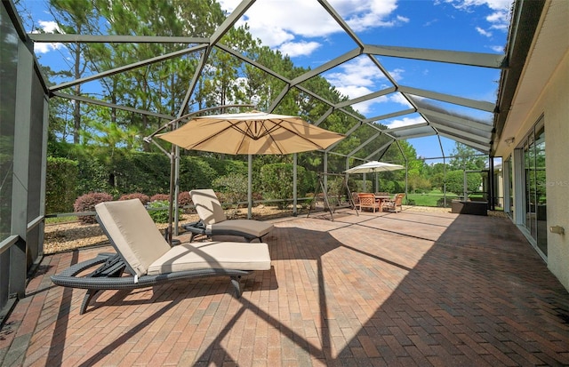 view of patio / terrace with glass enclosure