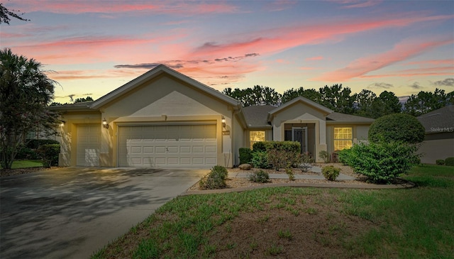 ranch-style home with a garage