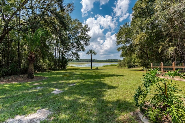 view of yard featuring a water view