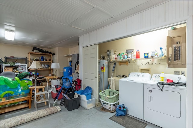 laundry area featuring gas water heater, independent washer and dryer, electric panel, and sink