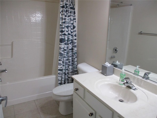 full bathroom with tile patterned flooring, vanity, toilet, and shower / bath combo with shower curtain