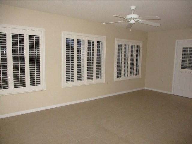 unfurnished room featuring ceiling fan